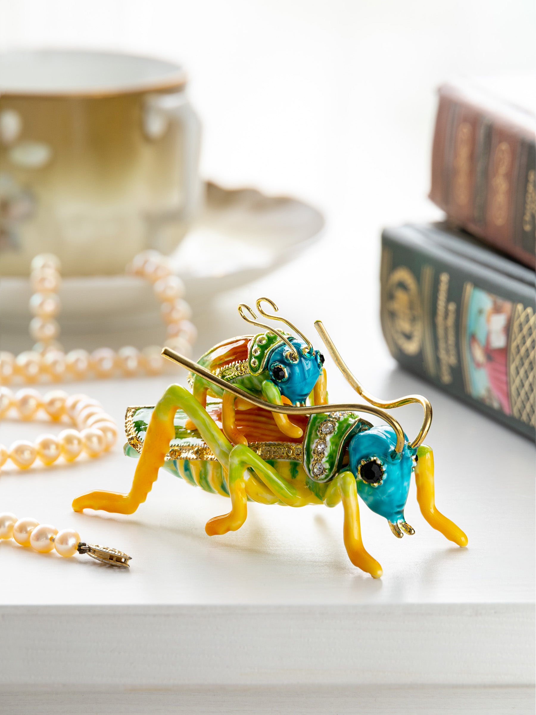 Keren Kopal Grasshopper with baby on the back