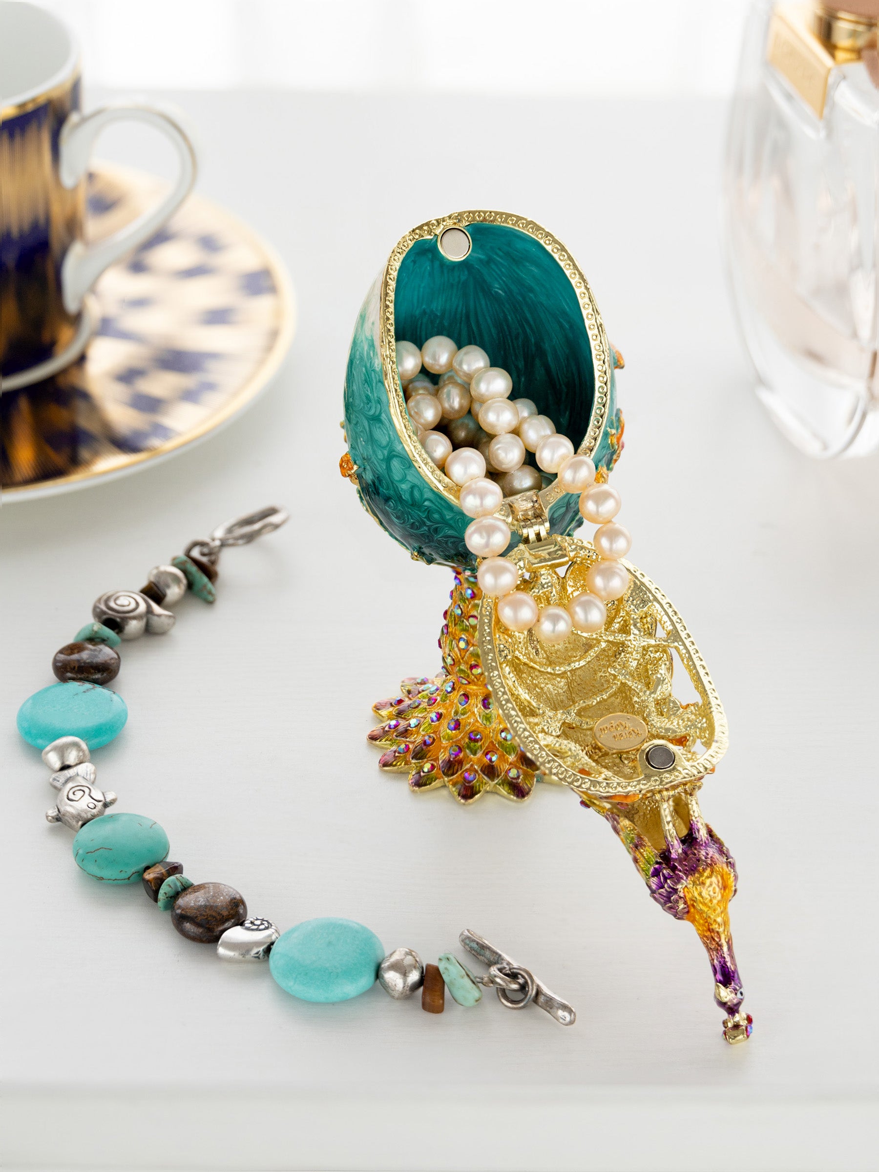 Keren Kopal Peacock on a Faberge Egg