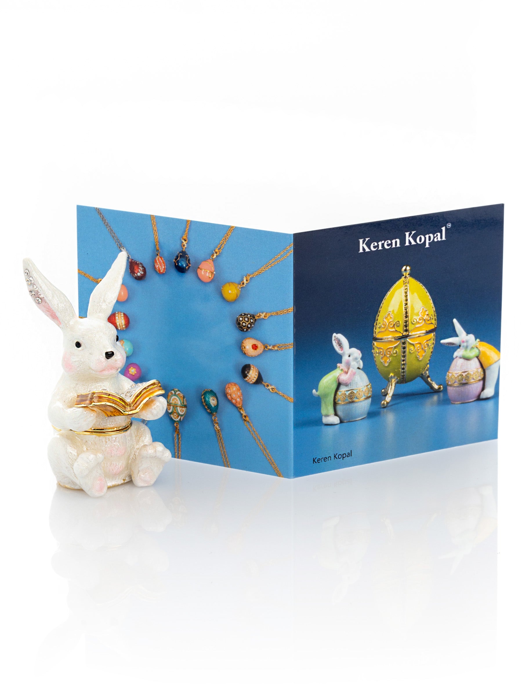 Keren Kopal bunny Sitting and Reading a Book