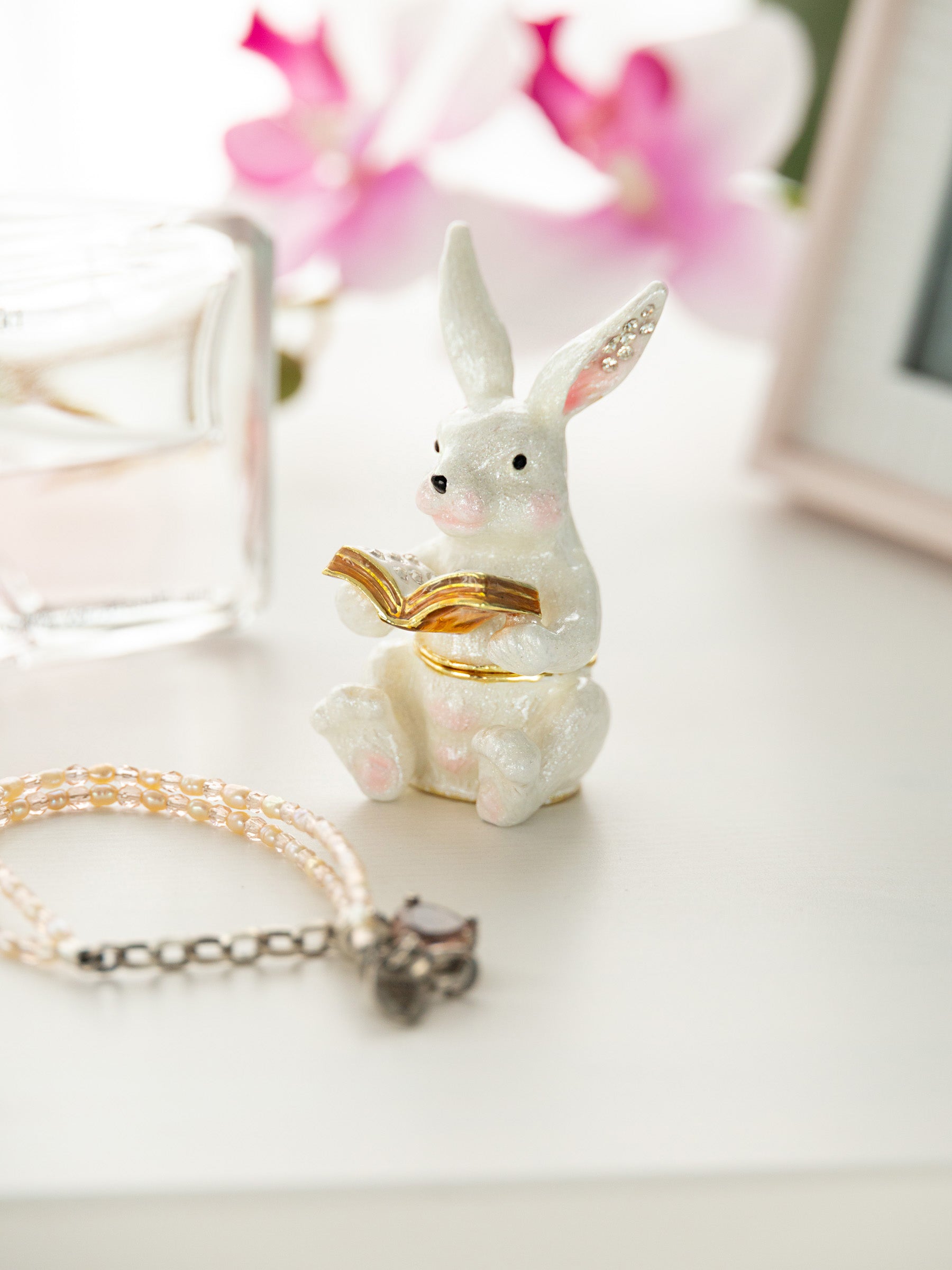 Keren Kopal bunny Sitting and Reading a Book