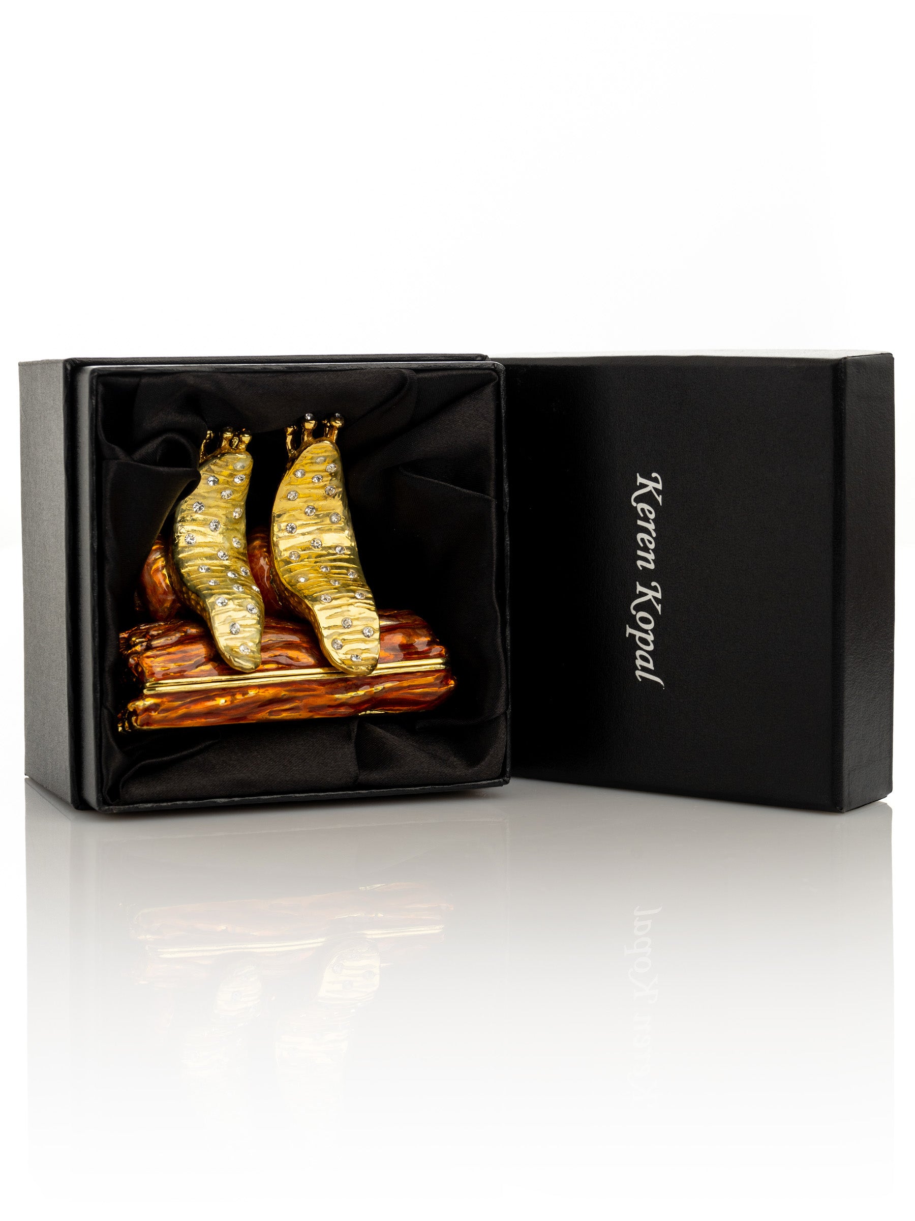 Keren Kopal Snails Sitting on a Log