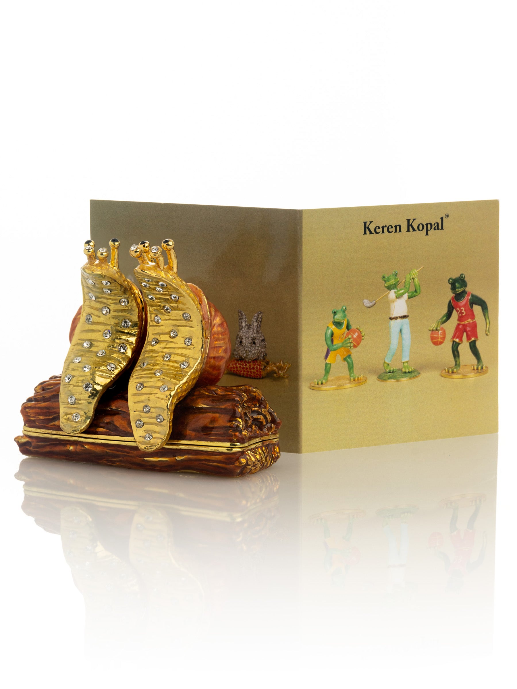 Keren Kopal Snails Sitting on a Log