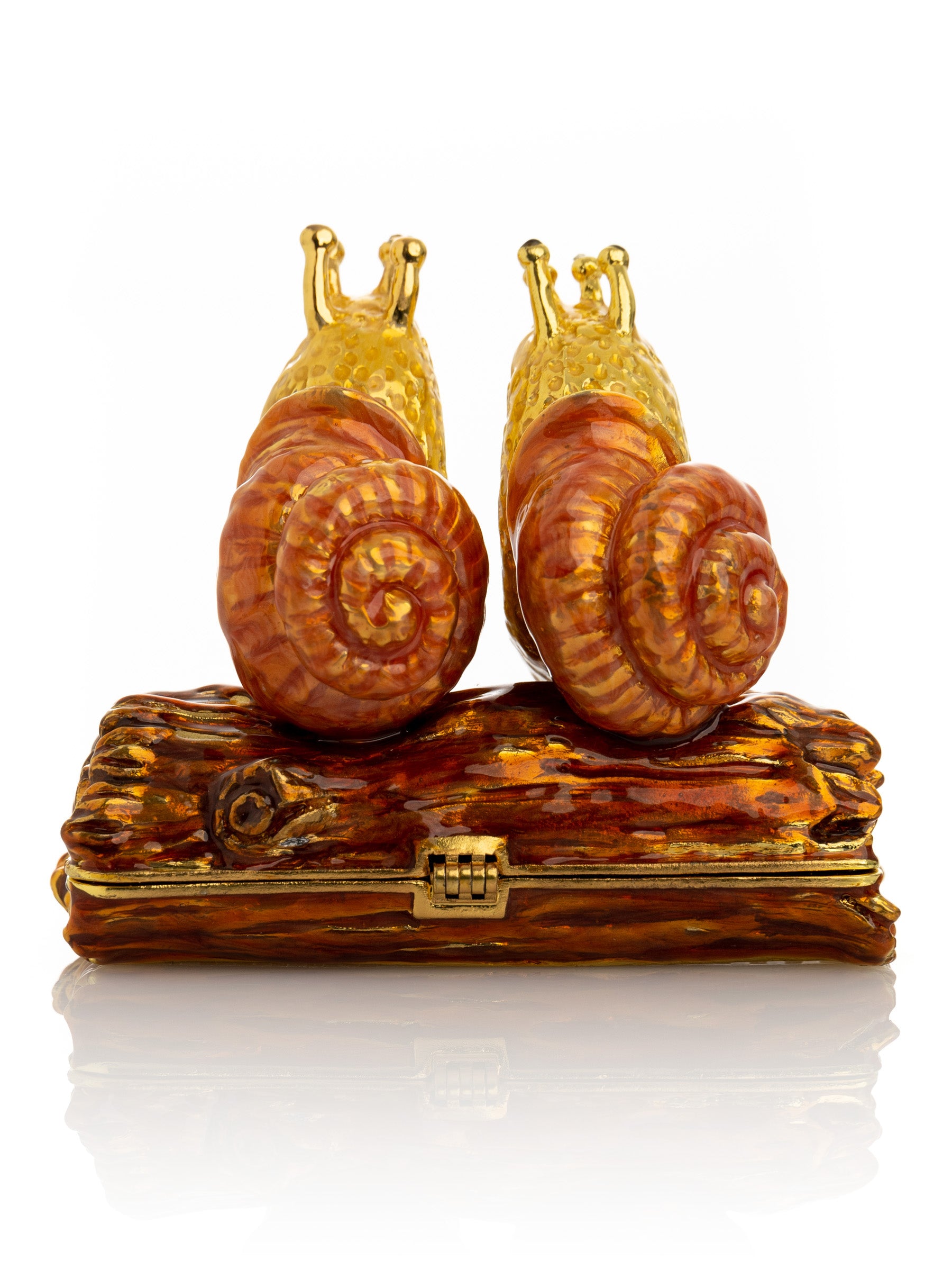 Keren Kopal Snails Sitting on a Log