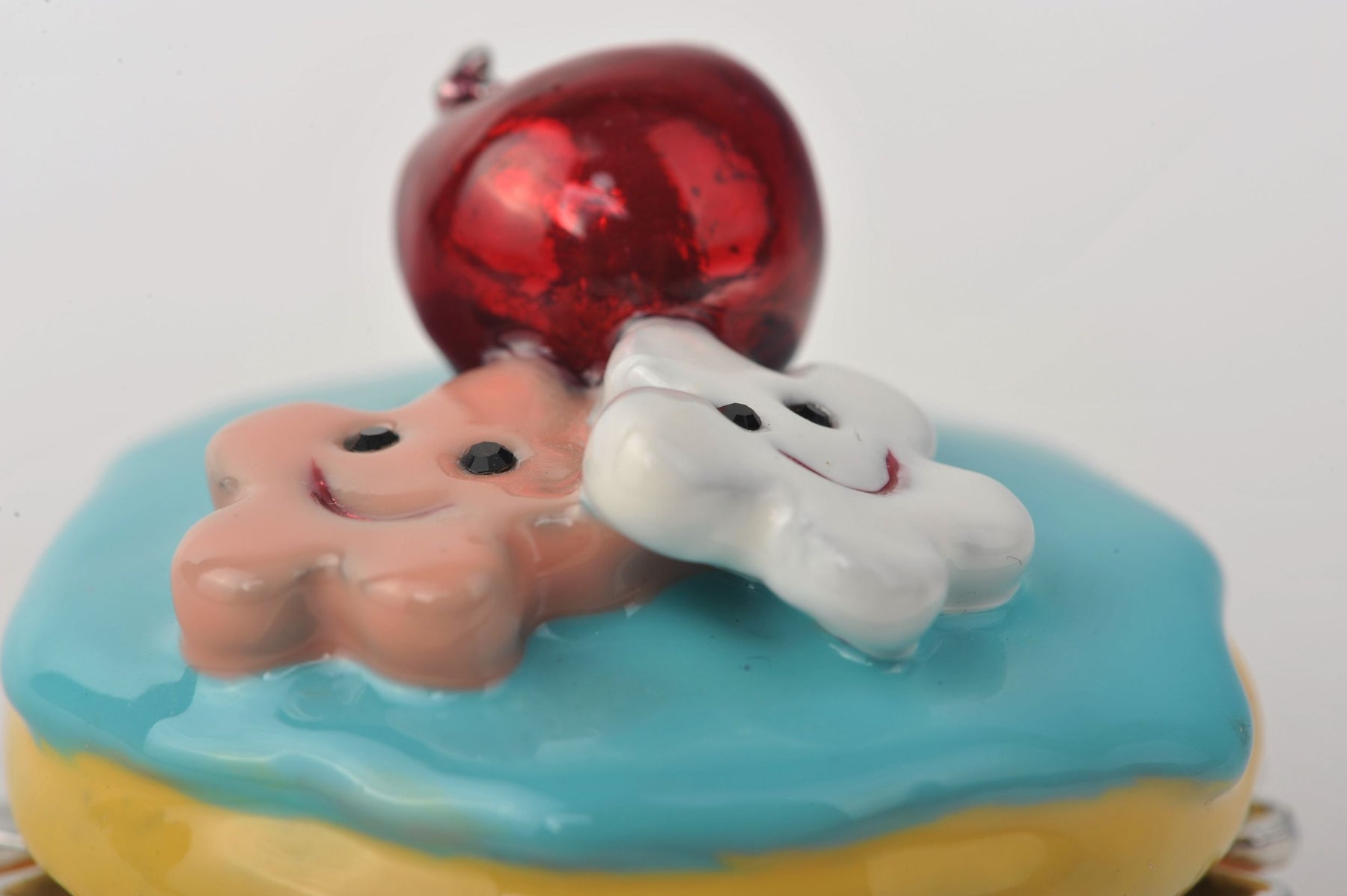 Keren Kopal Blue and Yellow Frosting Cupcake