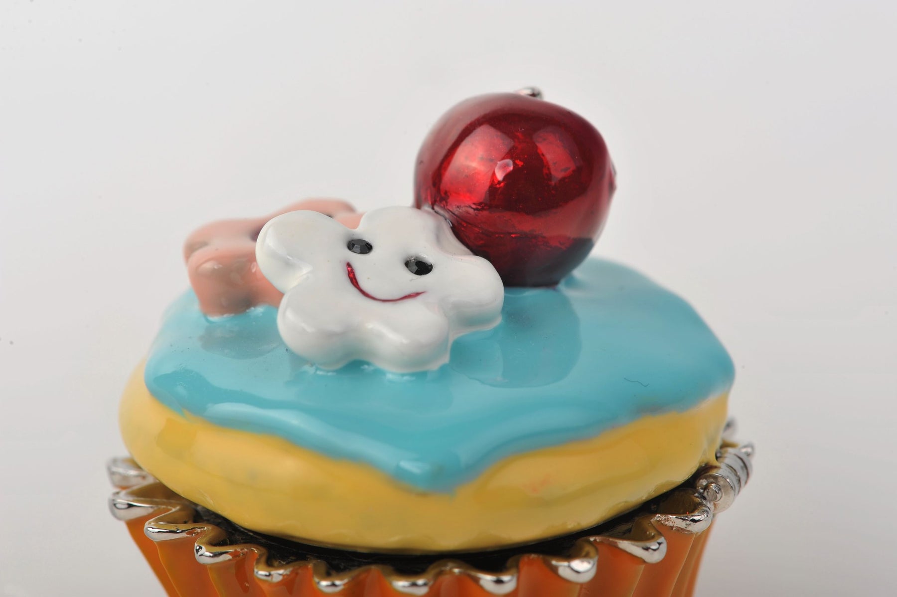 Keren Kopal Blue and Yellow Frosting Cupcake