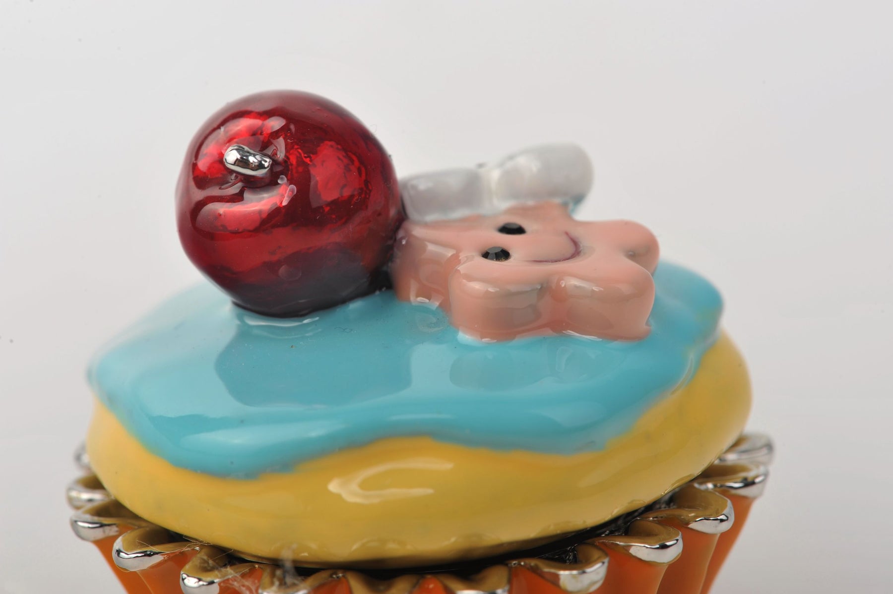 Keren Kopal Blue and Yellow Frosting Cupcake