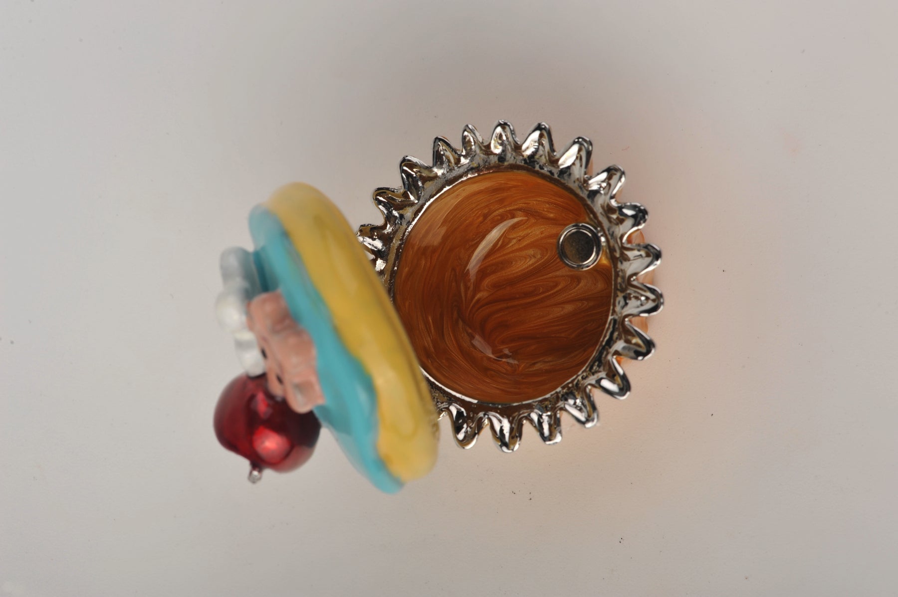 Keren Kopal Blue and Yellow Frosting Cupcake