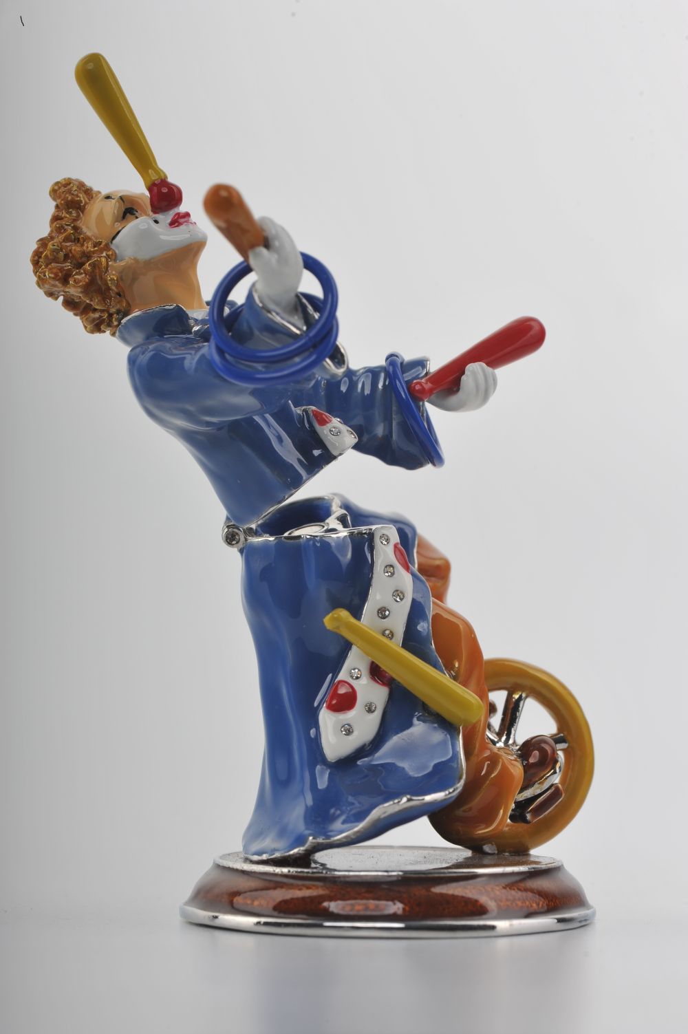 Keren Kopal Circus Clown Juggles on a Unicycle