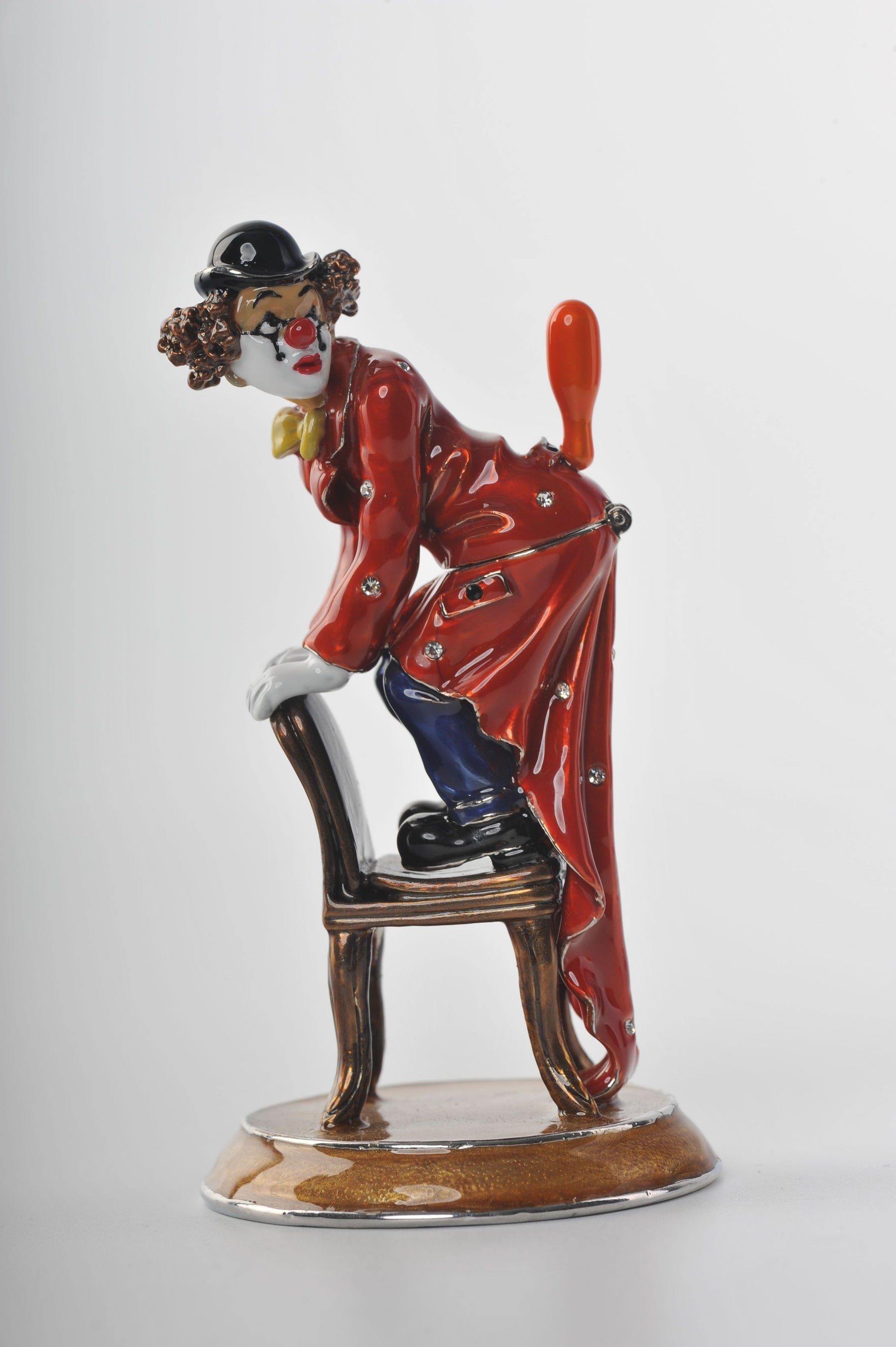 Keren Kopal Clown Standing on a Chair