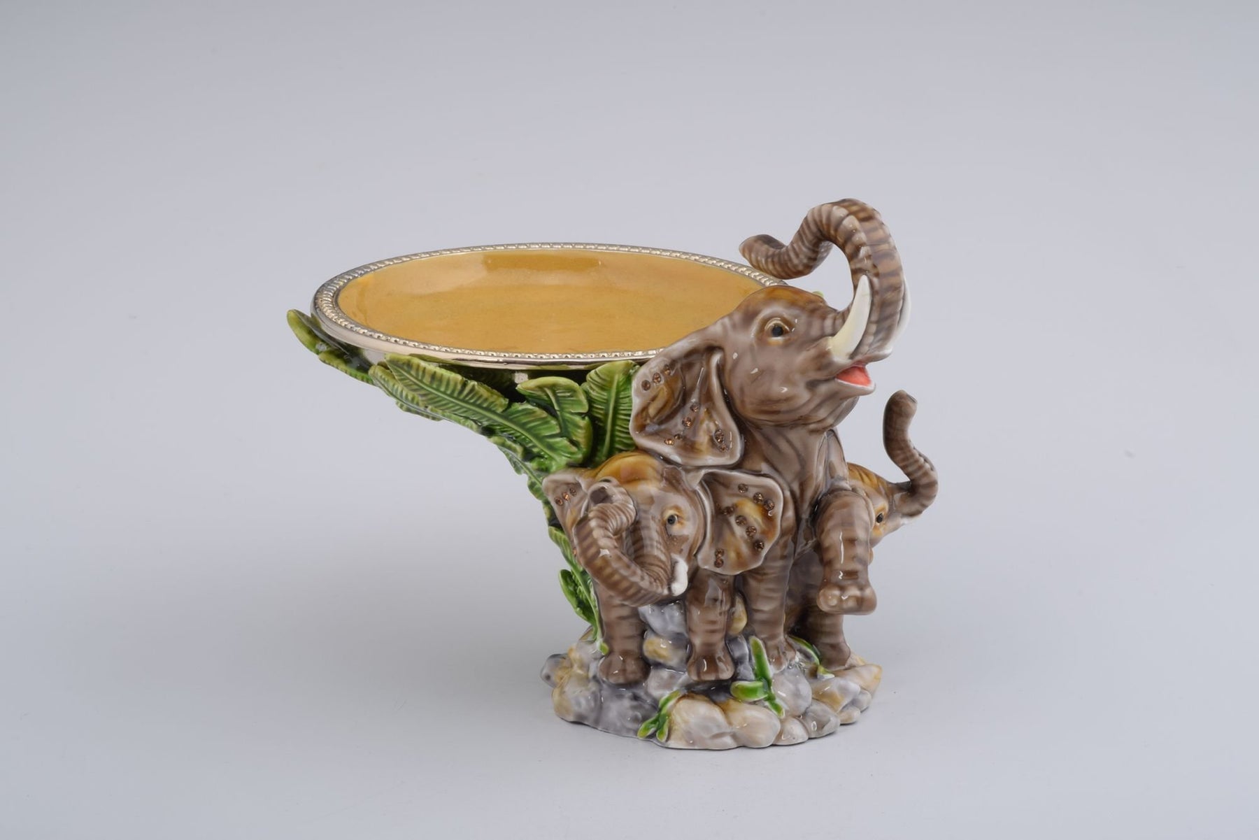 Keren Kopal Elephant Holding a Plate