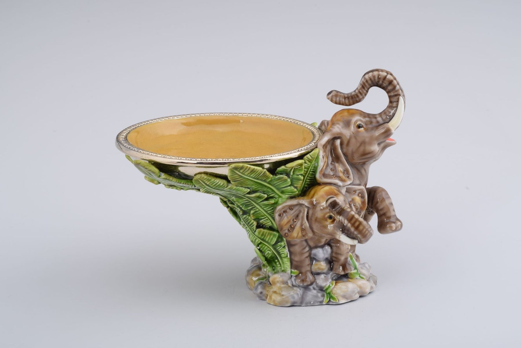 Keren Kopal Elephant Holding a Plate