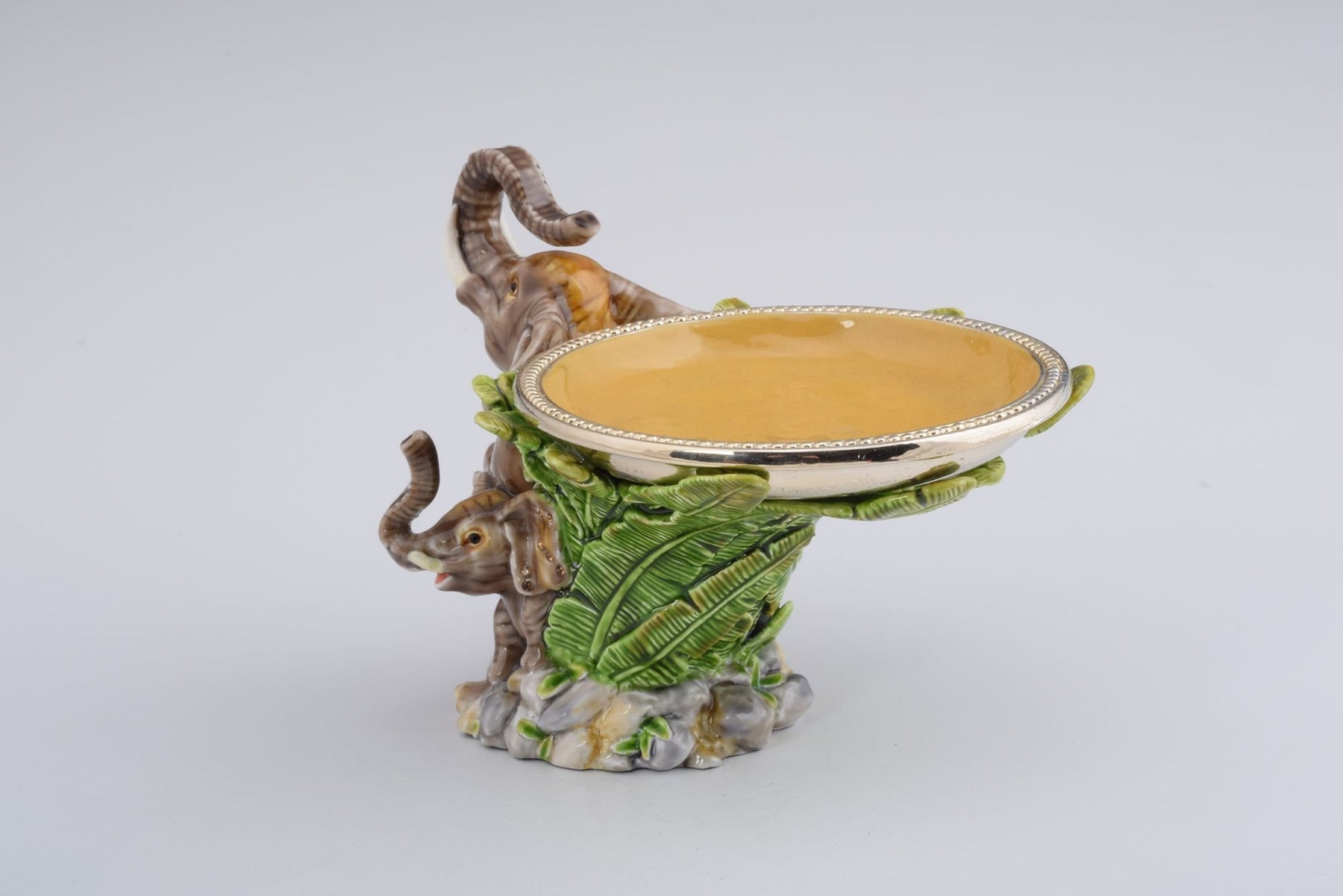 Keren Kopal Elephant Holding a Plate