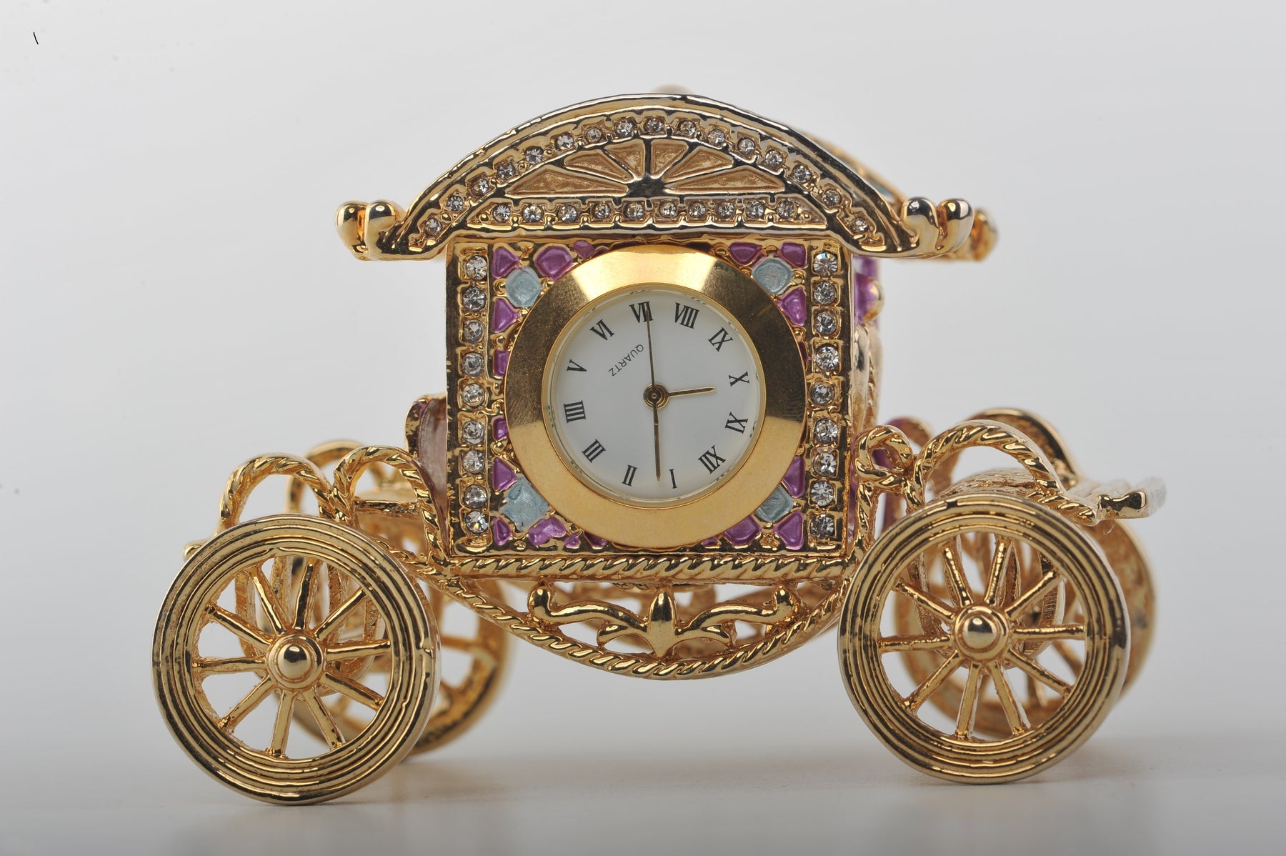 Keren Kopal Gold Carriage with a Clock
