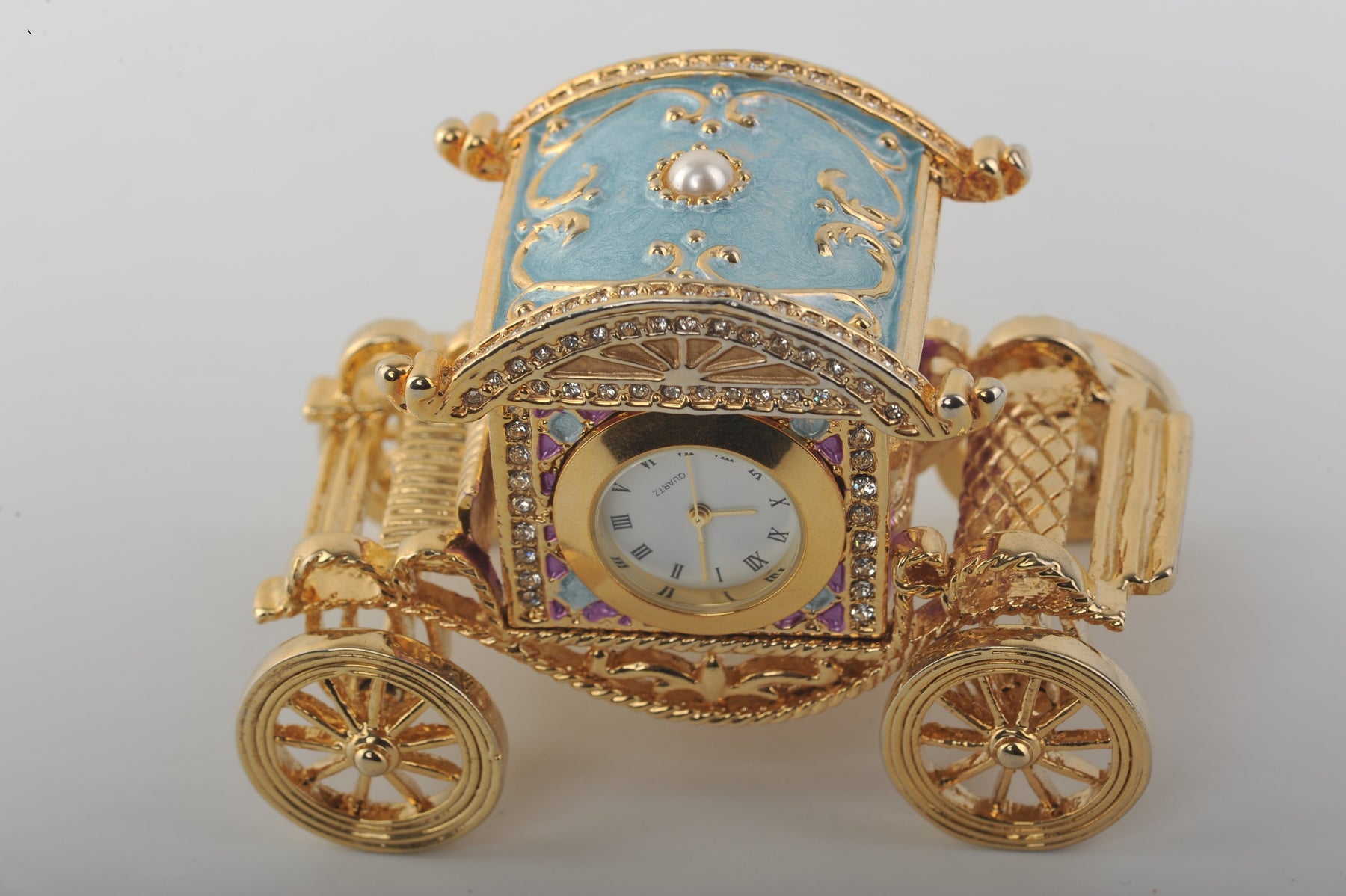 Keren Kopal Gold Carriage with a Clock