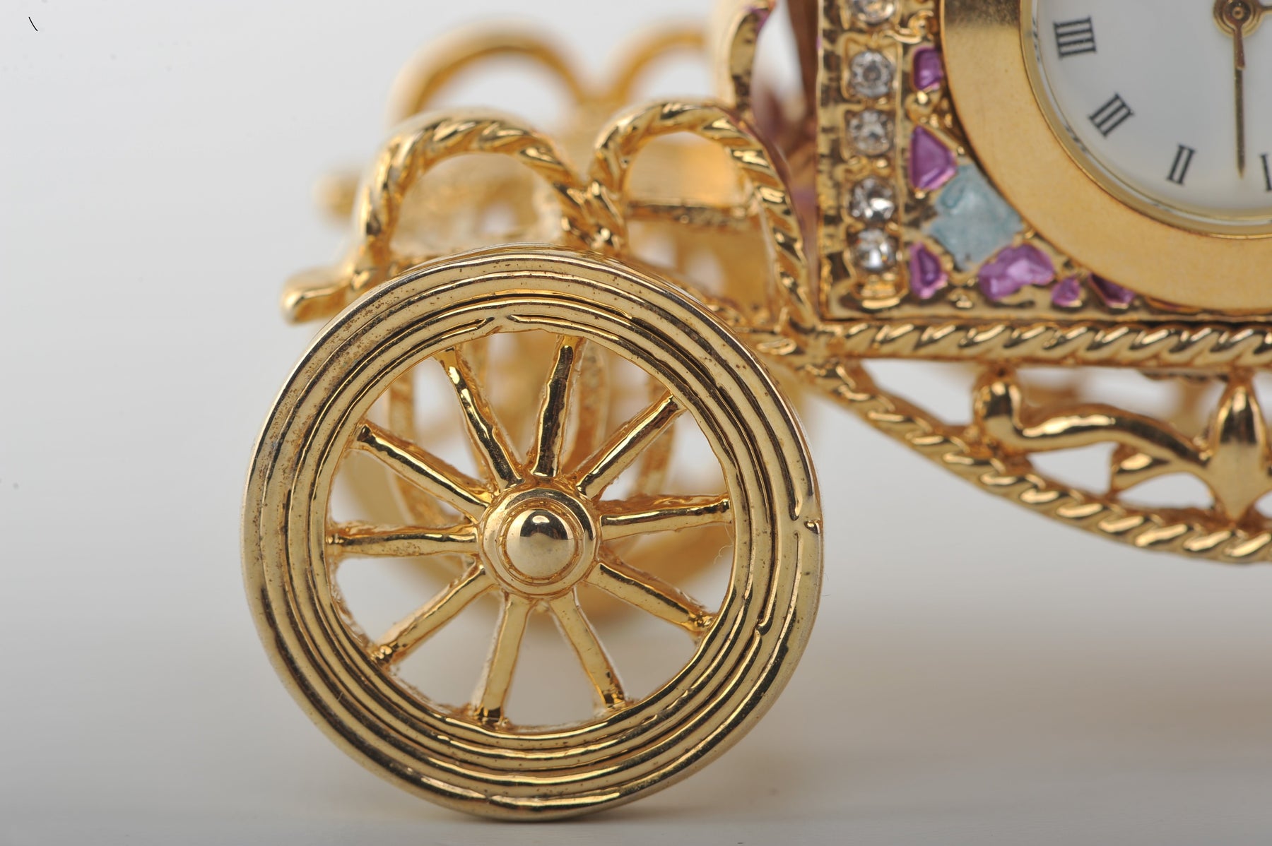 Keren Kopal Gold Carriage with a Clock