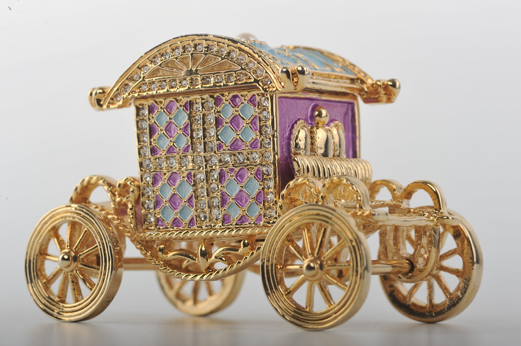 Keren Kopal Gold Carriage with a Clock