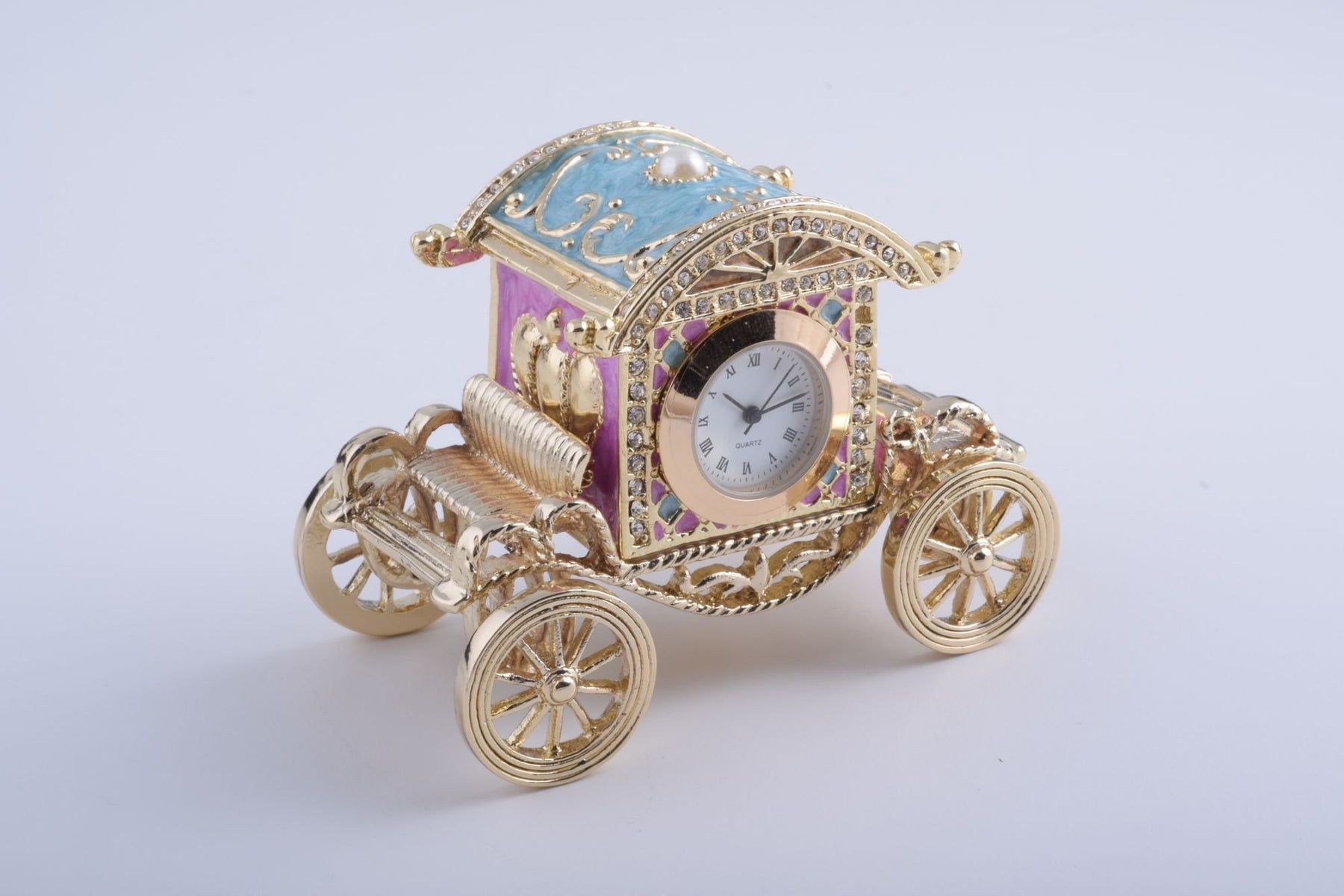Keren Kopal Gold Carriage with a Clock