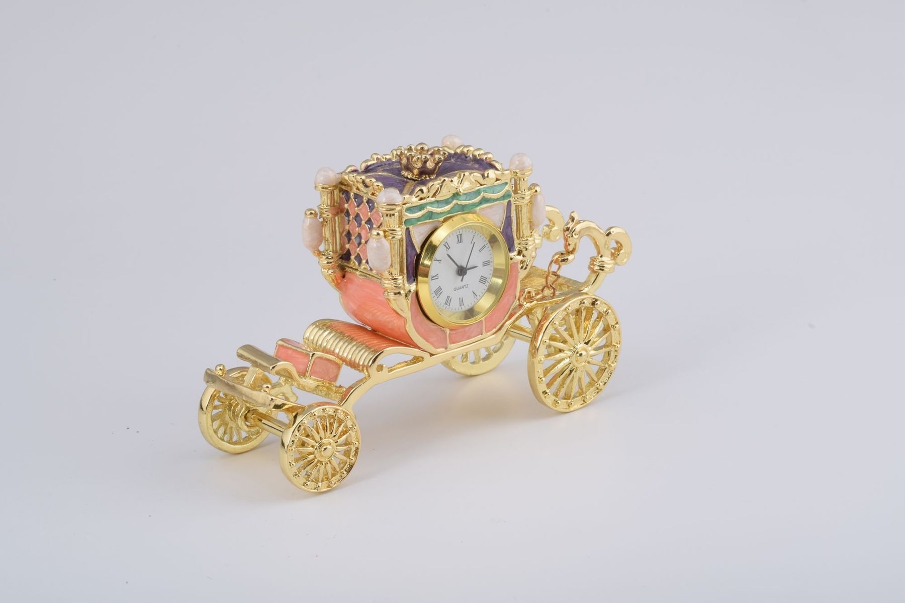 Keren Kopal Golden Carriage with a Clock
