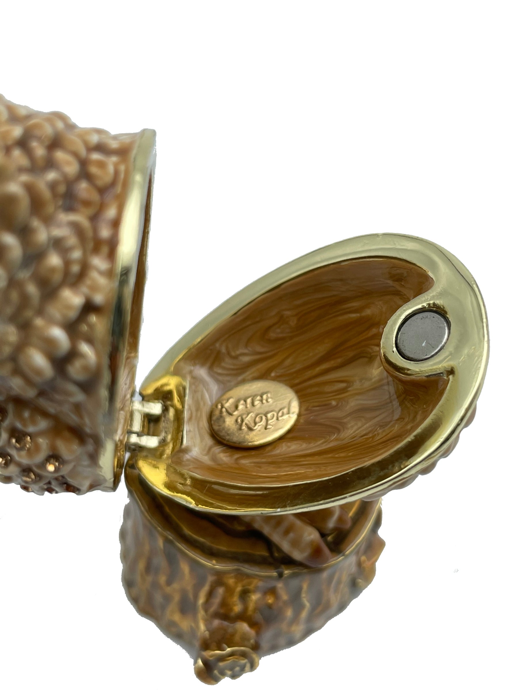 Keren Kopal Brown Owl on a tree log