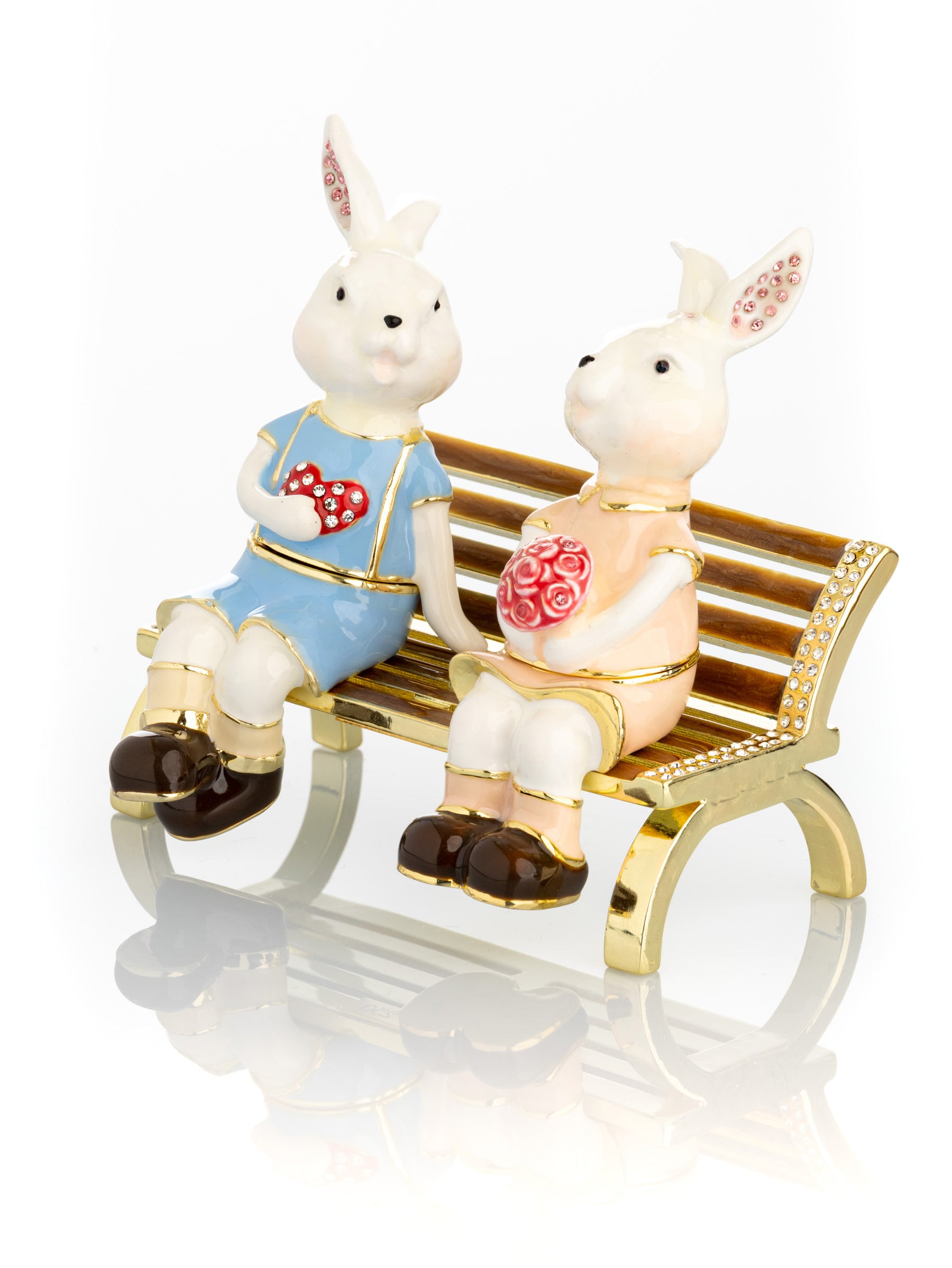 Keren Kopal 2 bunnies in love sitting on a bench, valentine flowers and chocolates