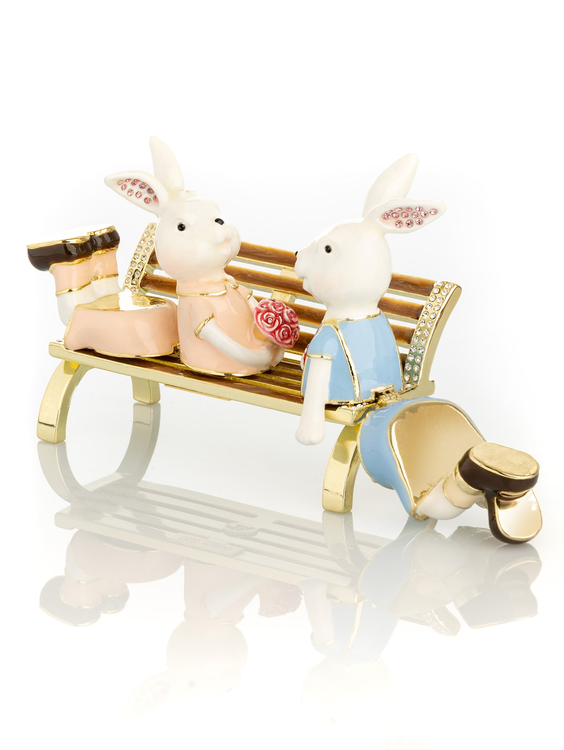 Keren Kopal 2 bunnies in love sitting on a bench, valentine flowers and chocolates