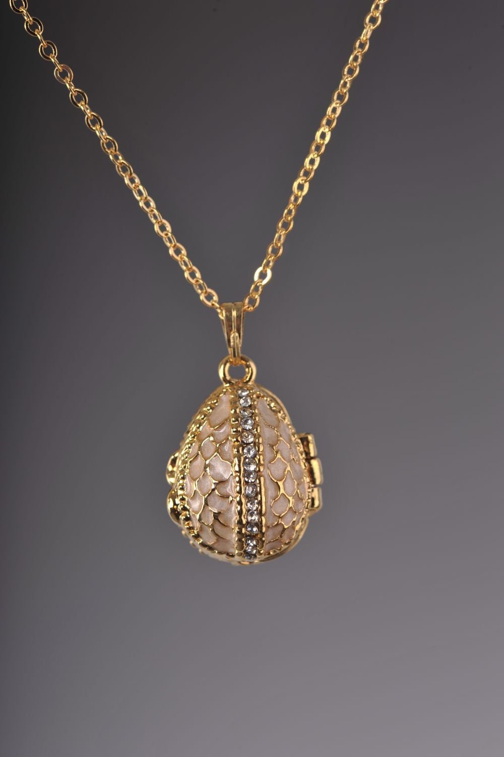 Keren Kopal Moccasin Egg Pendant with a Beetle