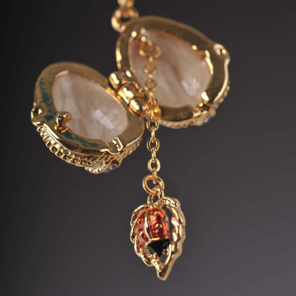 Keren Kopal Moccasin Egg Pendant with a Beetle