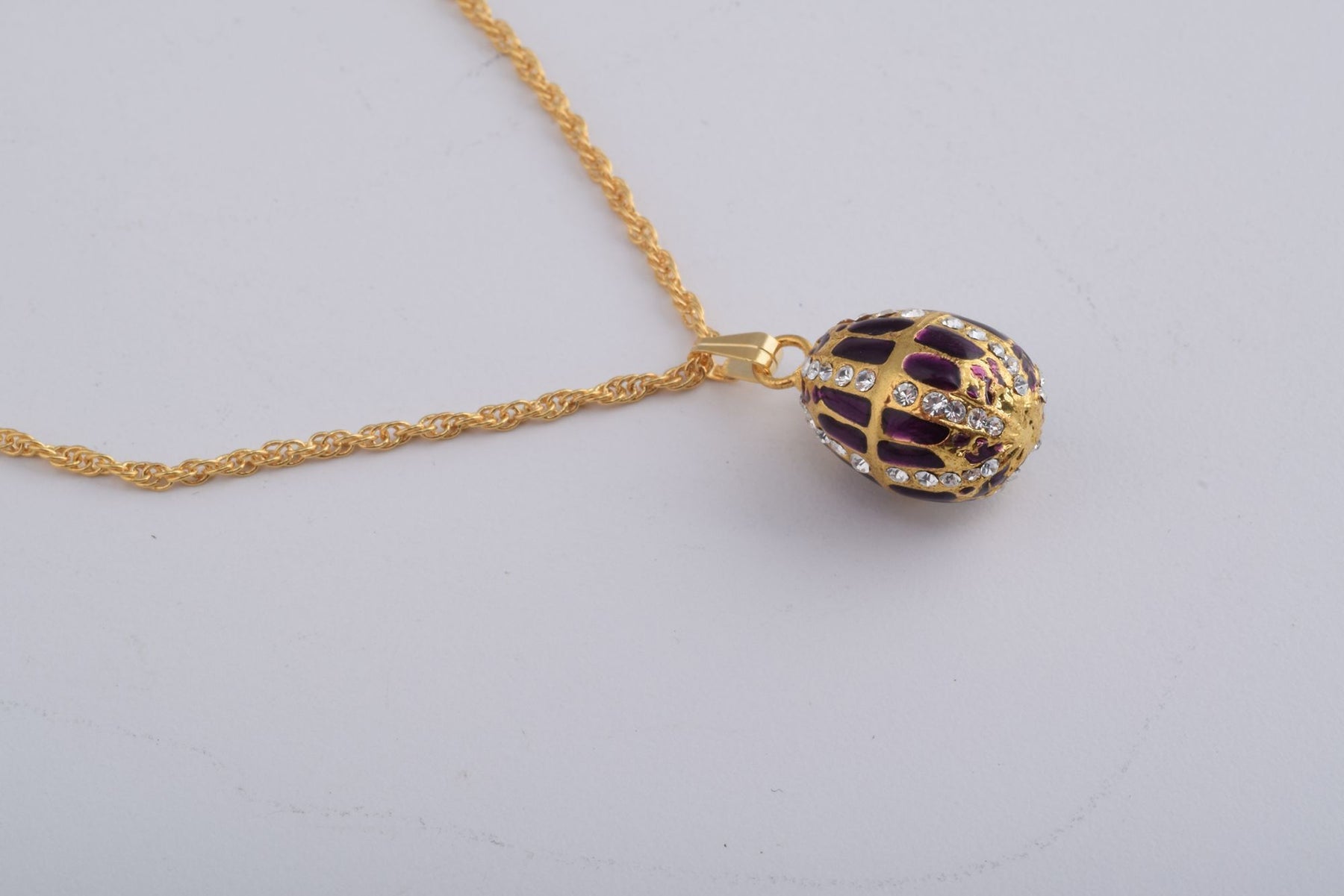 Keren Kopal Purple Faberge Style Egg with an Egg Pendant Inside