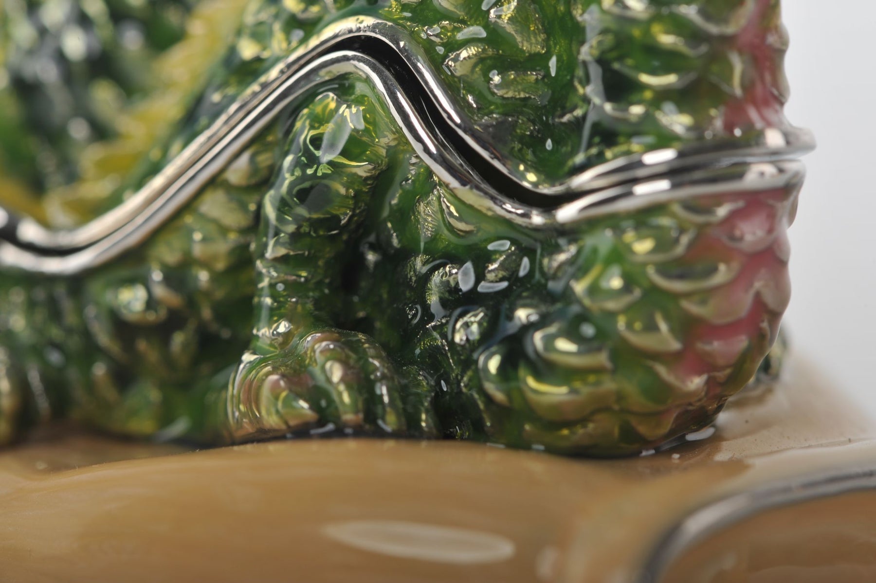 Keren Kopal Zodiac Dragon Laying on Hand