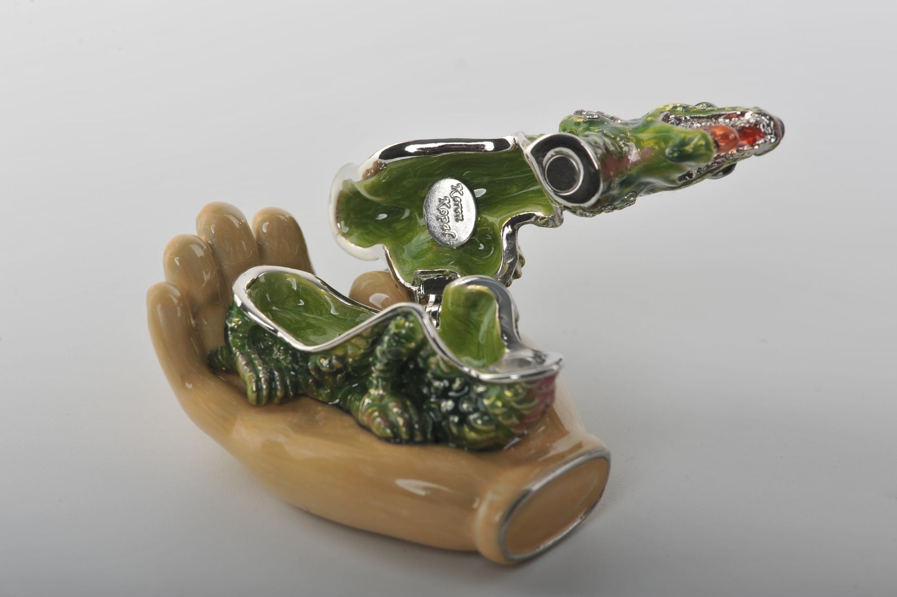 Keren Kopal Zodiac Dragon Laying on Hand