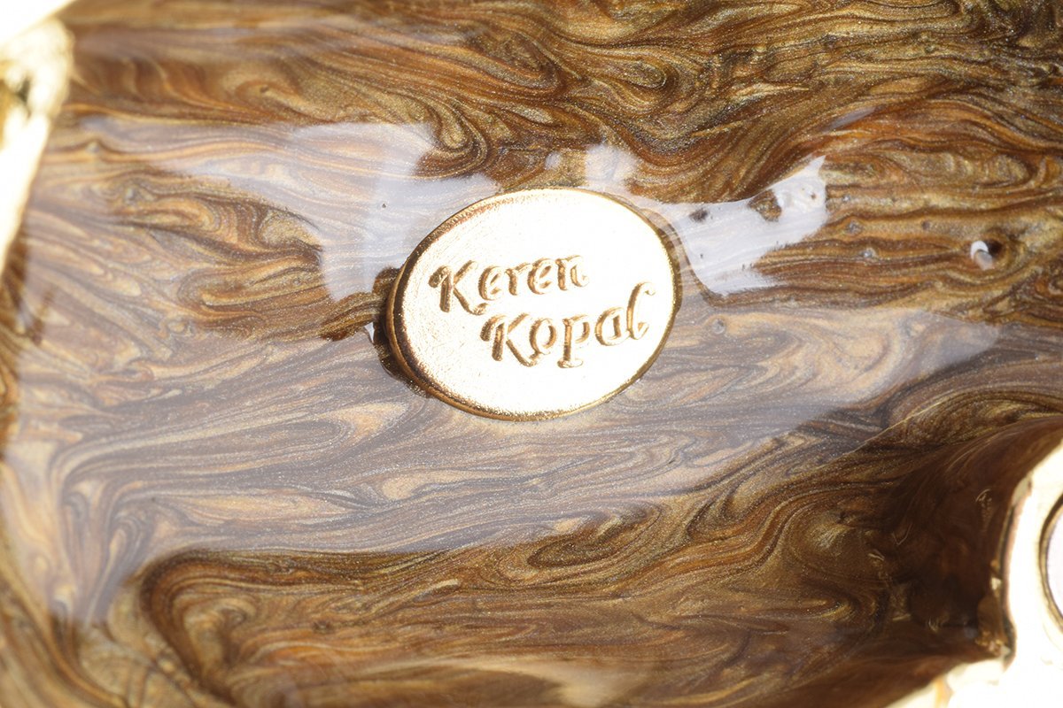 Keren Kopal Brown Bear Holding Fish