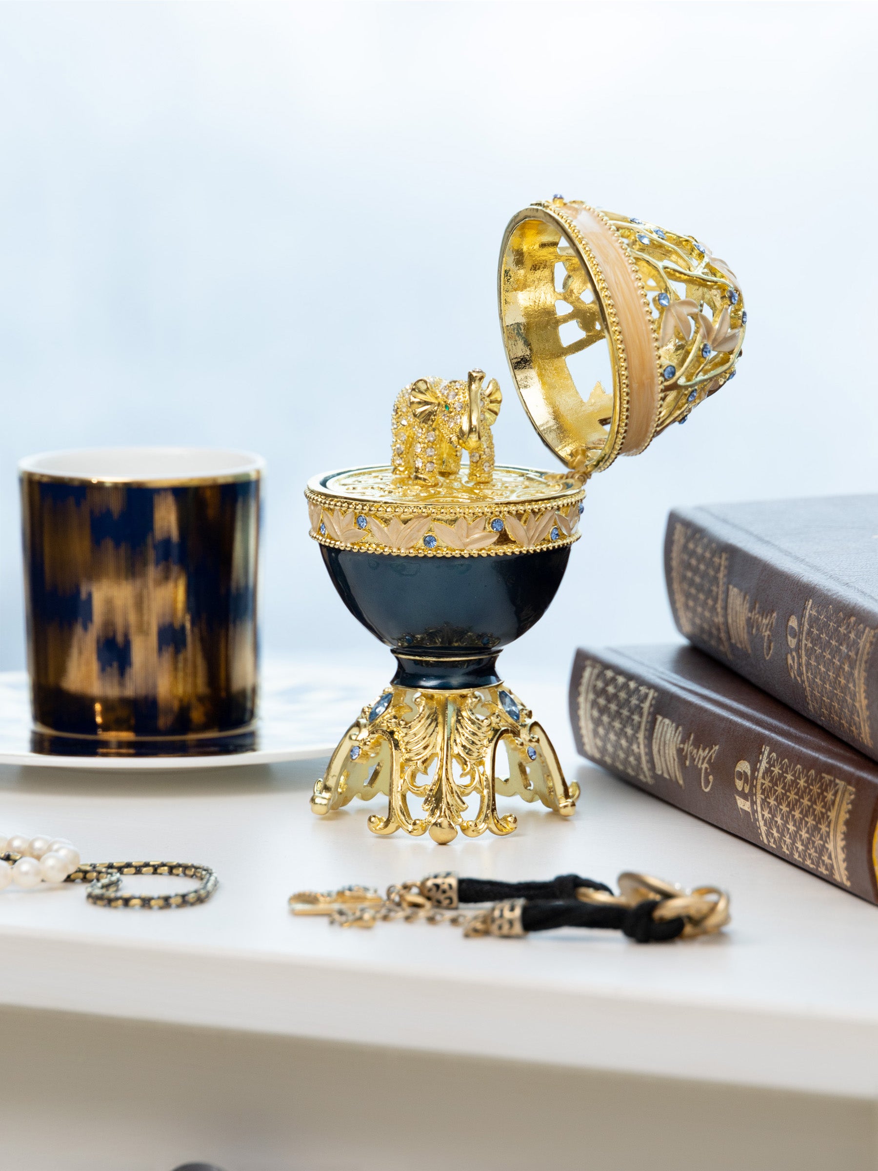 Keren Kopal Golden Blue Faberge Egg with a Golden Elephant