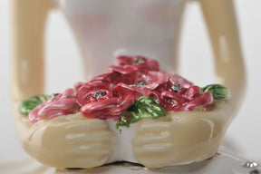 Ballet Dancer Holding Pink Flowers