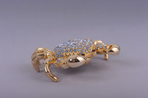 Golden Crab with blue stones