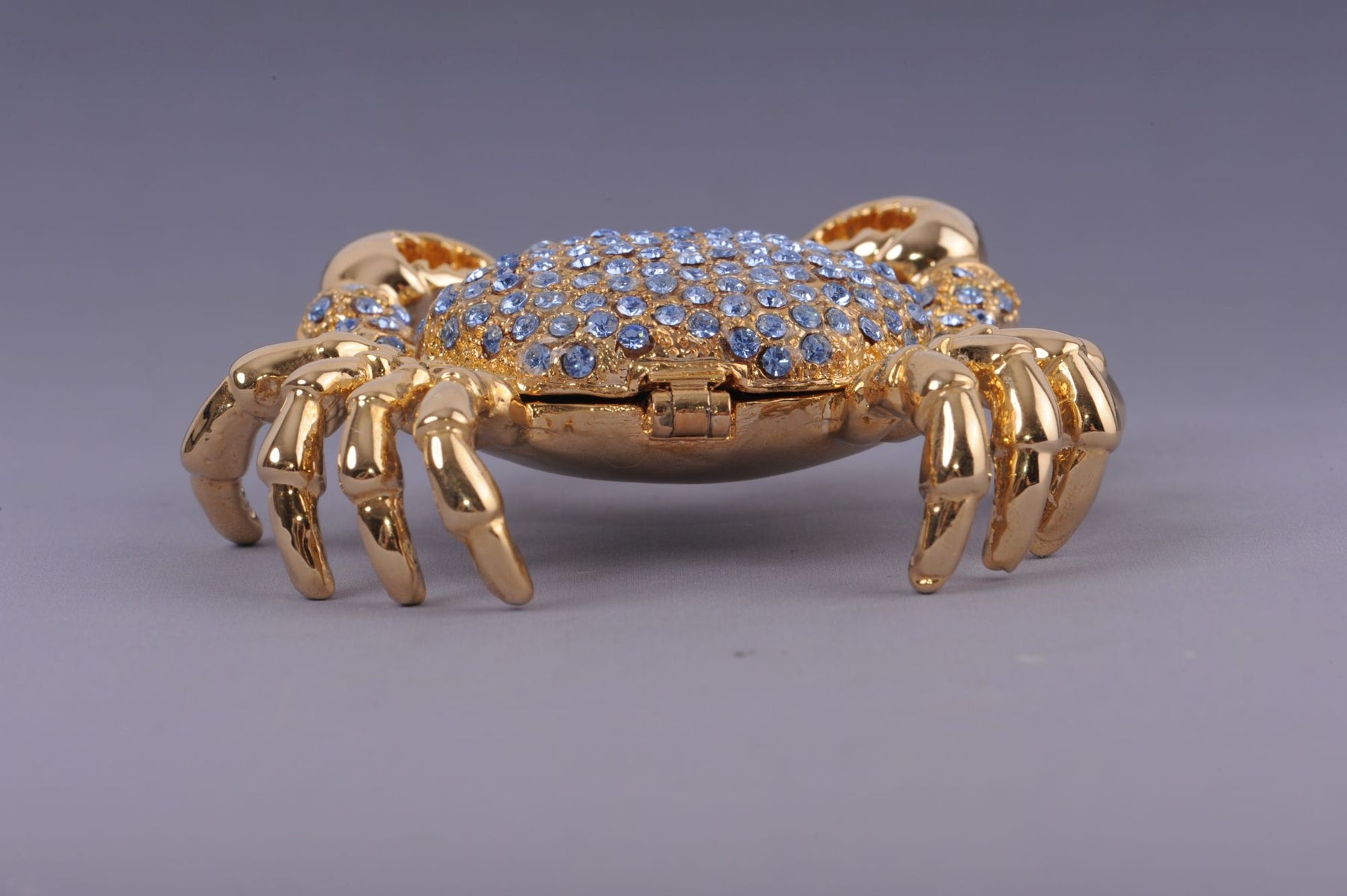 Golden Crab with blue stones