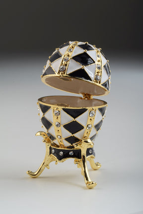 Black and White Faberge Egg with Gold Necklace Inside