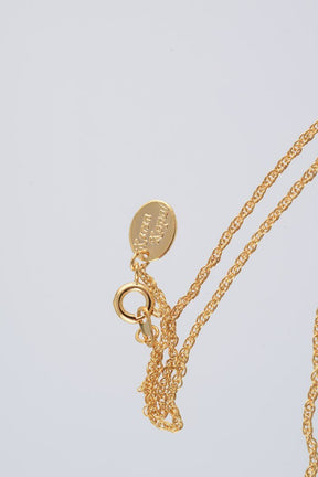 Keren Kopal Gold & Black Egg Pendant Necklace  39.00