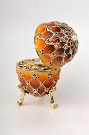 Keren Kopal Orange and Yellow Faberge Egg with a Gold Clock  118.25