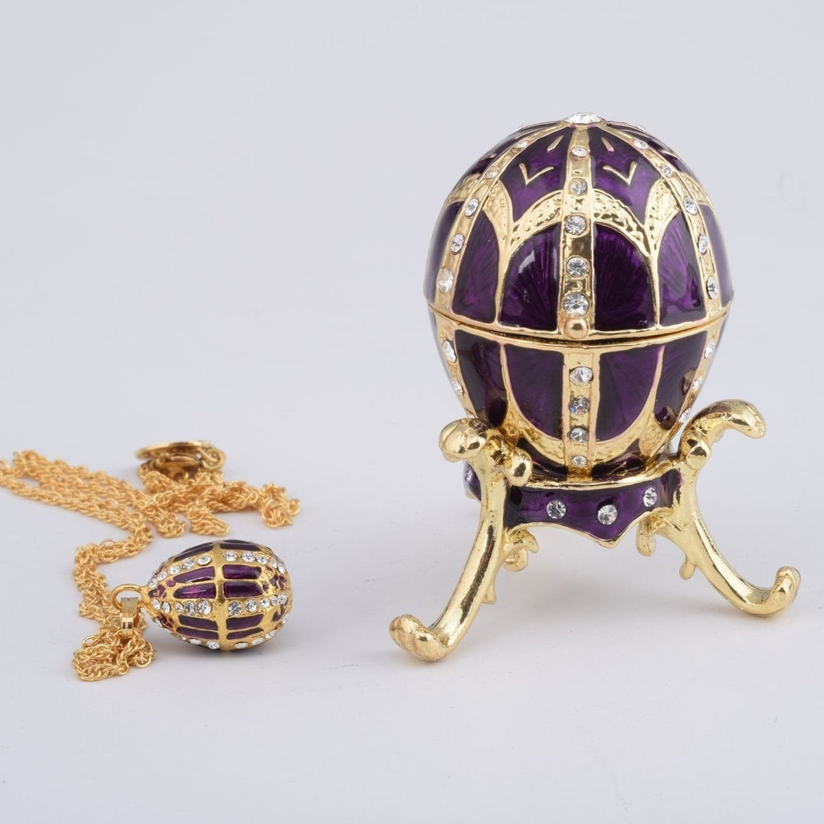 Keren Kopal Purple Faberge Style Egg with an Egg Pendant Inside  67.75