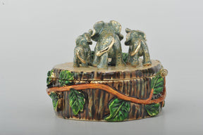 Keren Kopal Three Elephants on Tree Trunk  69.50