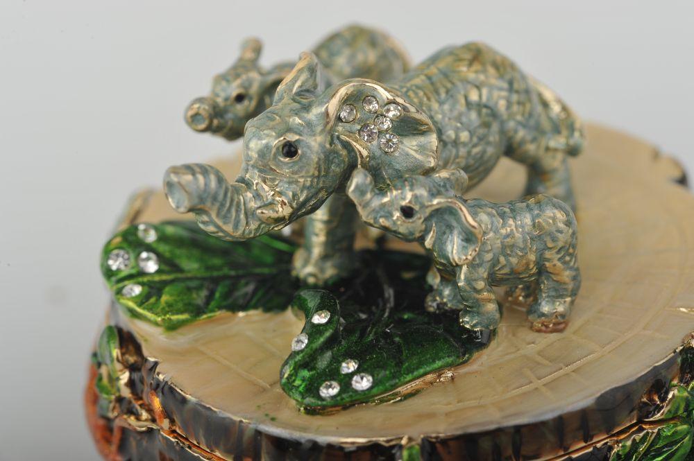 Keren Kopal Three Elephants on Tree Trunk  69.50